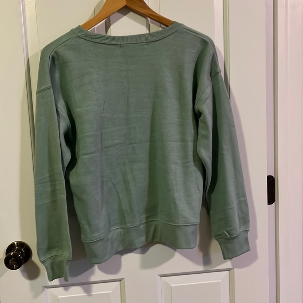 Green crew neck sweatshirt